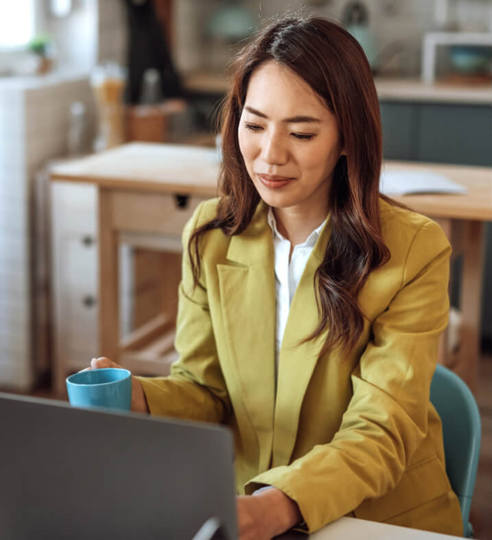 Image of a person working on a computer